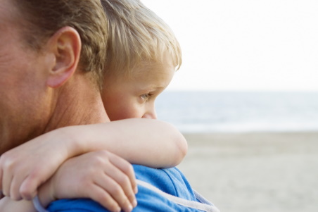 Supportive child hugs their parent
